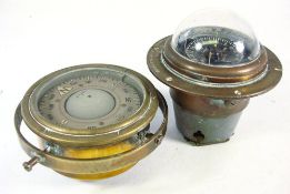 A Sestrel deck mounted compass together with a 4 inch liquid filled compass in a gimbaled brass