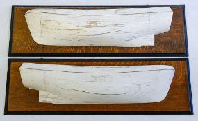 A pair of builders half block models of fishing vessels: each with plank and pinned hull on an oak