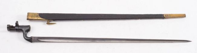 An 1895 pattern socket bayonet for a Martini Enfield: in a gilt brass mounted black leather
