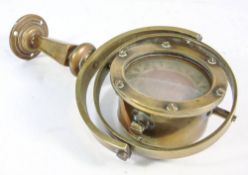 A 3 inch liquid filled brass compass by Lilley & Reynolds Ltd,