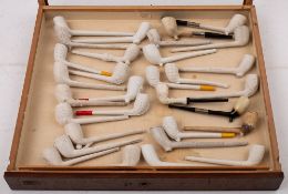 A collection of sixty seven various clay and meerschaum pipes:, including figural bowl, talon bowl,