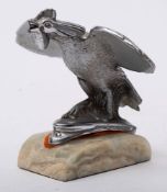 A 1930s Singer Bantam Art Deco car mascot:, in the form of a stylized Bantam,