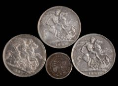 Two 1897 crowns, an 1891 crown and a George III 1817 shilling.