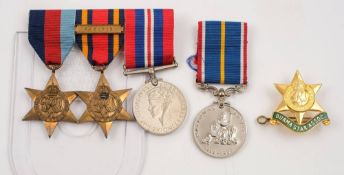 A WWII group of three comprising 1939-45 Star, Burma Star with clasp and War medal:,