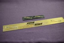 A Late Victorian/Edwardian ebony and brass parallel rule: with moustache mounts, 22.