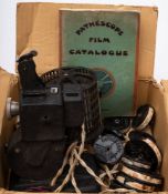 An early 20th century Pathescope hand cranked projector: numbered 'Z37515' with caged transformer,