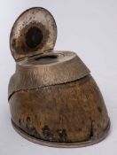 An early 20th Century silver plate mounted horseshoe inkwell inscribed 'Marvel':, 15cm long.