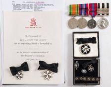An Elizabeth II Order of St John to Mrs Elsie Nisbet: Serving Sister medal , and breast badge,