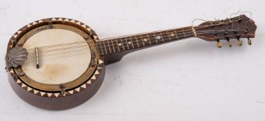 A Ruggero eight string mandolin banjo: with mother of pearl fret markers and geometric bone inlaid