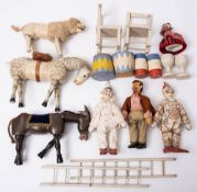 A group of early 20th century wooden Circus animals and figures: comprising a lion , a horse,