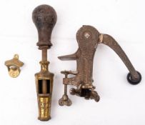 An early 20th century 'The Safety' bar counter lever operated corkscrew: with cast casing signed as