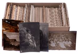 A collection of early 20th century and later photographic portrait postcards: mostly WWI military