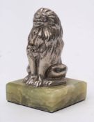 An early 20th century Bean Cars mascot in the form of a seated lion: mounted on later onyx plinth