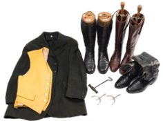 Two pairs of black leather riding boots, a pair of brown leather riding boots,