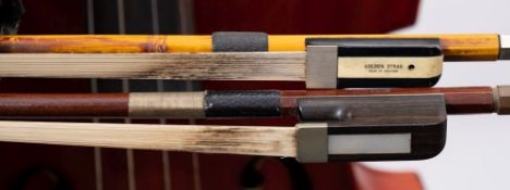 A three quarter size double bass:, unsigned, with scroll carved headstock and brass keys,