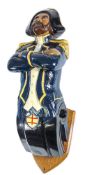 A carved figurehead 'The Admiral' by Charles Moore:, dressed in naval uniform with folded arms,