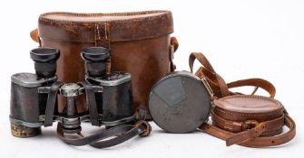A pair of early 20th century Carl Zeiss Jena DF8x24 binoculars: No 794483 in a brown leather case,