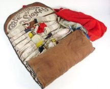 A roll of 'International Code of Signals' flags in canvas case: (several flags missing) together