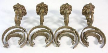A set of four early 20th century cabin brass gimbled candle wall light fittings,