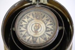 A late 19th /early 20th Century mahogany and brass binnacle: the 3 1/2 inch dry card compass in a