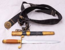 A Soviet Russian Naval Officer's Dirk: the straight plain double edged blade with Cyrillic makers