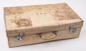 A mid-20th century white vellum travel case with fitted vanity case to interior: the vanity case