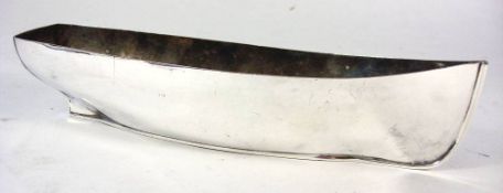 An early 20th Century silver plated serving dish in the form of a fishing boat hull by Elkington &