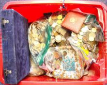A quantity of miscellaneous coins in two containers: