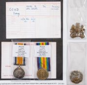 A WWI pair to '34970 Pte S Cowd Hamp's R' together with two cap badges:.