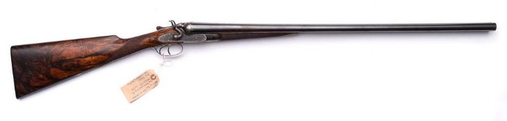 A 12-bore side by side hammer shotgun by James Woodward & Sons, London: No 4128,