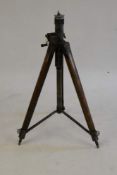 A mid-20th Century oak and brass mounted tripod: the metalware overpainted in a Naval grey colour,