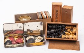 A collection of early 20th century stained ivory gaming counters: together with mother of pearl Mah