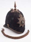 A Victorian British Army regulation pattern Army Service Corps blue cloth helmet by Hawkes & Co,