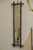 A late 20th Century oak cased Admiral Fitzroy barometer:, 105cm tall.