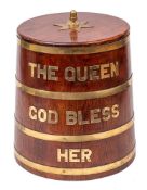 A Royal Navy style oak and brass bound rum barrel table: with acorn finial over coopered body with