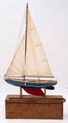 A scale model pond yacht 'Caledonian': fully rigged over planked deck with fittings,