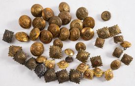 A collection of military brass buttons and officers' pips: various regiments including Royal