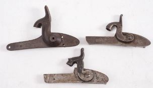 Three left handed percussion locks, one signed Cooper & Goodman:.