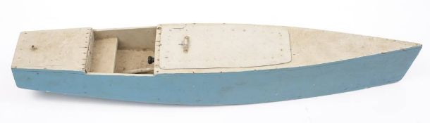A mid 20th century battery operated wooden toy speedboat:, unsigned,