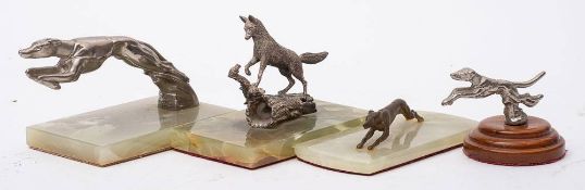 A 1930s greyhound car mascot on onyx base:,