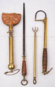 An Edwardian copper and brass heated mane comb by T E Bladdon,