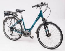A Raleigh Captus Electric bicycle: in dark green with Bosch 300 powerbank and recharger,