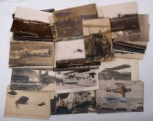 A collection of early 20th century aeronautical themed postcards: including a photograph of the
