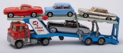 An unboxed group of five Corgi vehicles:, 228 Volvo P1800, 229 Chevrolet Corvair,