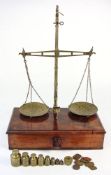 A set of 19th century lacquered brass and mahogany balance scales: unsigned,