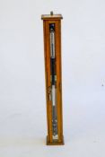 A black lacquer Fortin pattern Marine barometer by Griffin & Tatlock Ltd,