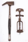 An open frame corkscrew with triple bar winder to shaft and wire helix,