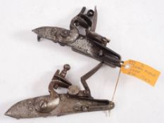 Two steel swan neck flintlock actions,one signed and dated 1742: the other unsigned (2).