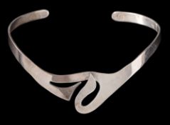 A Mexican white metal torque collar: of interlocked design.