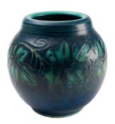 A Pilkingtons Royal Lancastrian pottery vase: of oviform incised with a band of foliage picked out